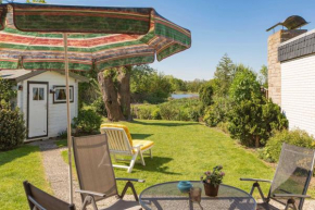 Haus hinter dem Deich Tossens
